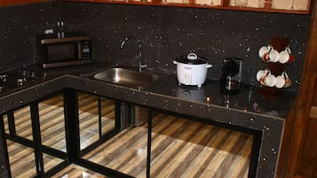 Microwave, coffee/tea maker, toaster, cookware/dishes/utensils