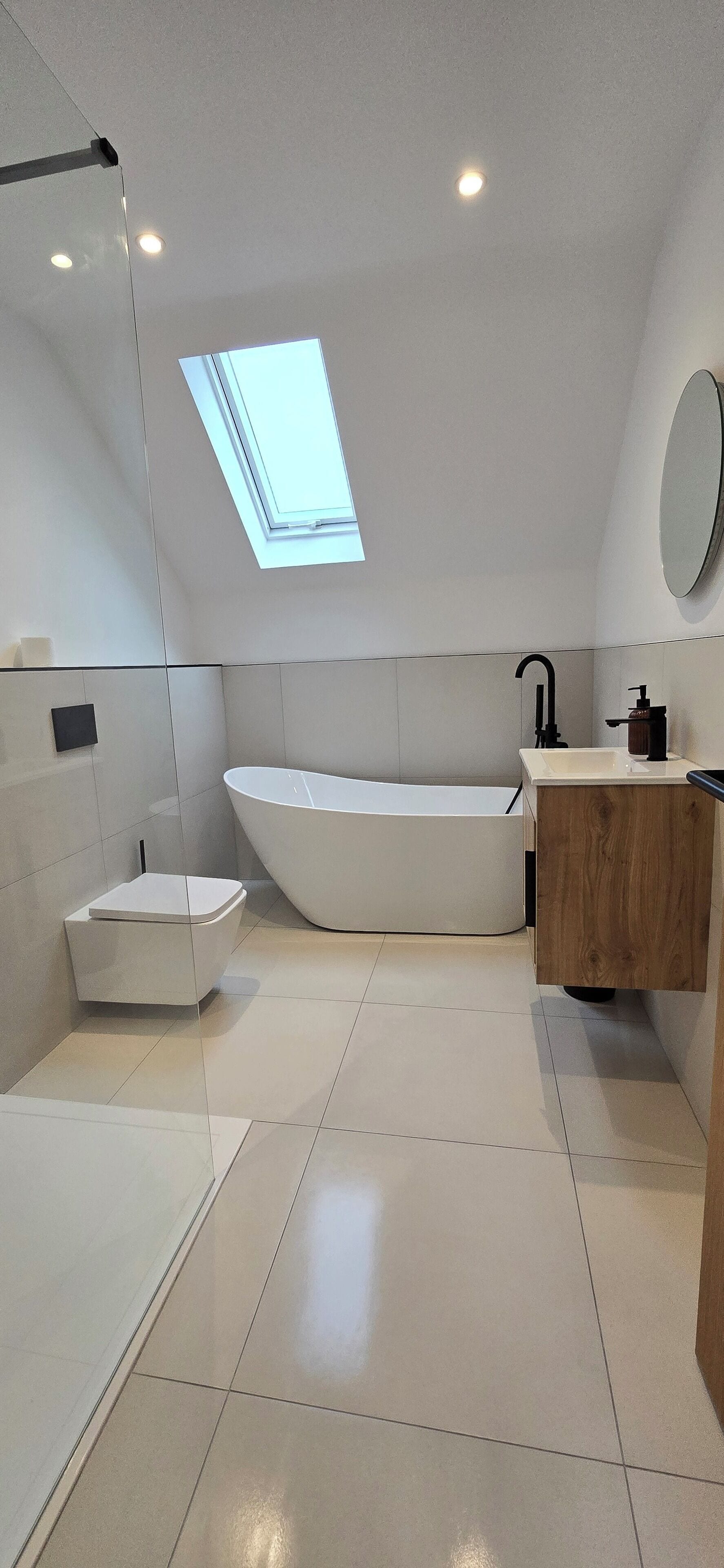 Shower, hair dryer, towels, toilet paper
