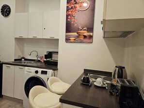 Microwave, toaster, high chair, cookware/dishes/utensils