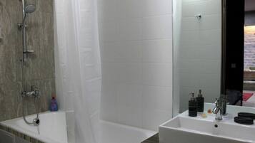 Hair dryer, towels, soap, toilet paper