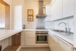 Microwave, stovetop, coffee/tea maker, electric kettle