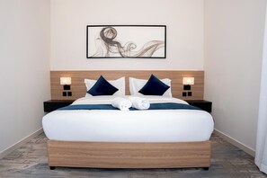 ジュニア スイート | 高級寝具、ピロートップベッド、ミニバー (無料)、WiFi (無料)