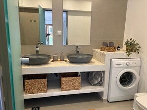 Hair dryer, towels, soap, shampoo