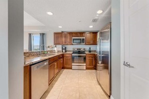 Fridge, microwave, oven, stovetop - Southern Comfort at The Aruba - Pool open! (Daytona Beach)