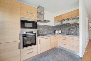 Apartment | Private kitchen | Fridge, microwave, oven, stovetop
