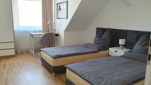 2 bedrooms, desk, iron/ironing board, travel crib