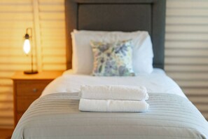 1 bedroom, desk, iron/ironing board, travel cot