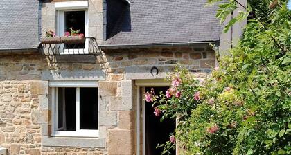 Typical Breton house with garden near the sea and the Bay of Saint Brieuc