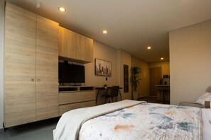 1 bedroom, desk, iron/ironing board, travel cot