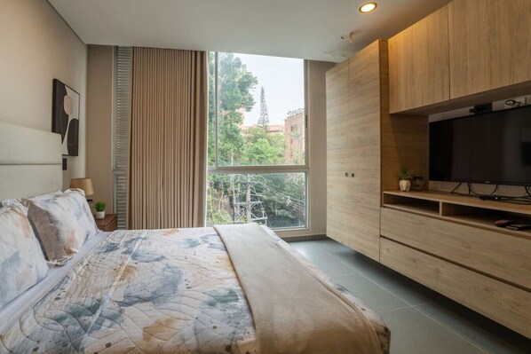 1 bedroom, desk, iron/ironing board, travel cot