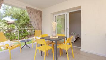 Comfort Quadruple Room, Pool View | Terrace/patio