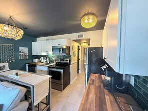 Fridge, microwave, dishwasher, coffee/tea maker