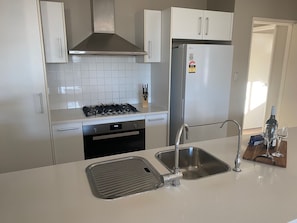 Family House | Private kitchen | Full-size fridge, microwave, oven, stovetop