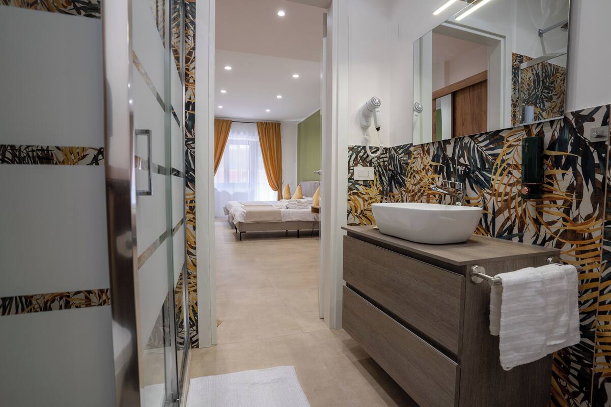Comfort Triple Room, Balcony | Minibar (free items), in-room safe, desk, laptop workspace