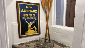 A poster with the text "BIÈRE DE SOCHAUX" and a window with a wooden blind. - Country house with a pool, 3 minutes from Vaison-la-Romaine. (VAISON LA ROMAINE)