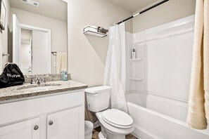 Hair dryer, towels, soap, toilet paper