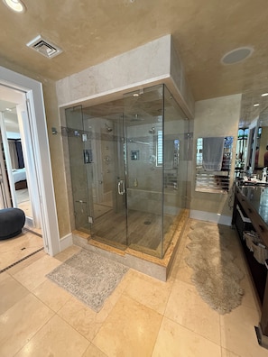 Shower, hair dryer, towels, soap