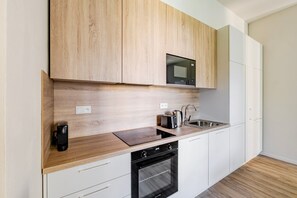 Microwave, oven, dishwasher, cookware/dishes/utensils - Blueground | Letná, furnished studio, foodie area (PRG-54) (Prague)