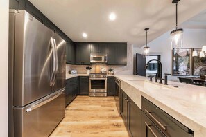 Microwave, stovetop, dishwasher, coffee/tea maker