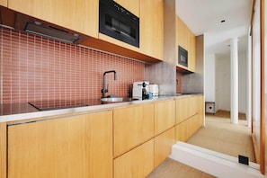 Apartment | Private kitchen | Fridge, microwave, stovetop, dishwasher