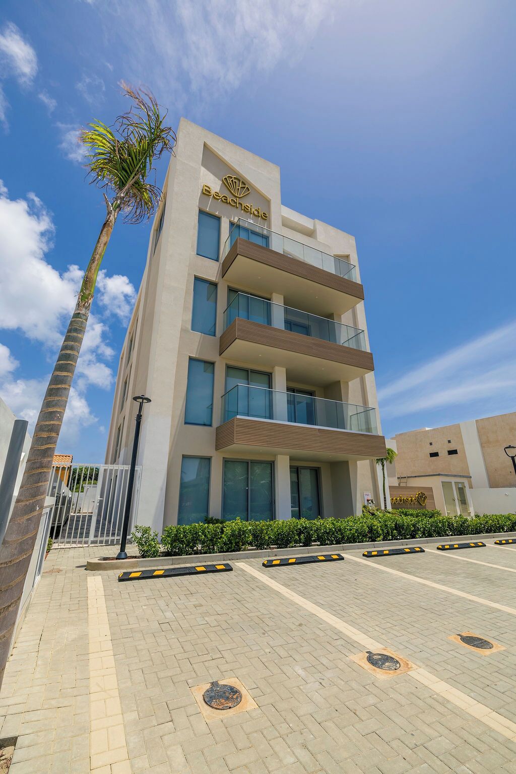 A modern building with a sign reading "Beachside".