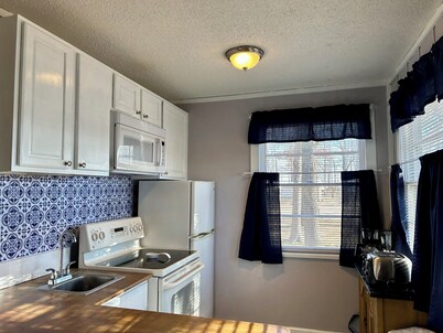 Cozy 2-bedroom Cabin with Deck and Lake View!