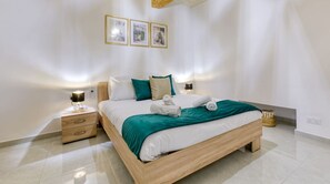 1 bedroom, desk, iron/ironing board, travel cot