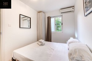 Desk, iron/ironing board, travel crib, WiFi