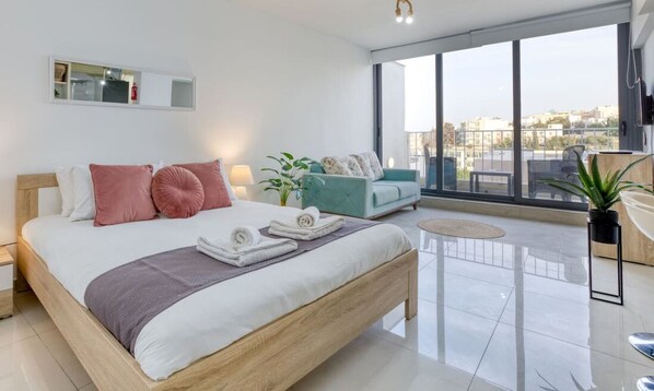 1 bedroom, desk, iron/ironing board, travel crib