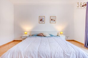 2 bedrooms, desk, iron/ironing board, travel crib