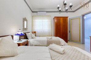 3 bedrooms, desk, iron/ironing board, travel cot