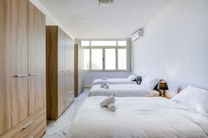 3 habitaciones, tabla de planchar con plancha, cuna de viaje y wifi 