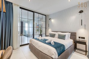 Desk, iron/ironing board, travel crib, WiFi