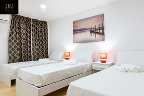 4 bedrooms, desk, iron/ironing board, travel cot