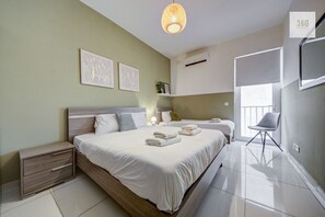 3 bedrooms, desk, iron/ironing board, travel cot