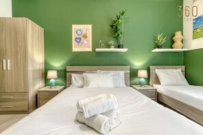 Desk, travel cot, WiFi, bed sheets