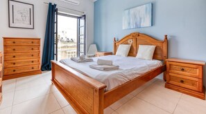 1 bedroom, desk, iron/ironing board, travel crib