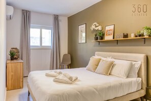 2 bedrooms, desk, iron/ironing board, travel crib