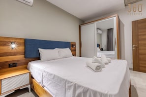 1 bedroom, desk, iron/ironing board, travel cot
