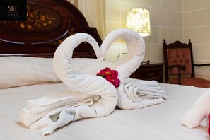 1 bedroom, desk, iron/ironing board, travel crib