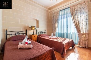 1 bedroom, desk, iron/ironing board, travel cot