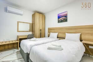 2 bedrooms, desk, iron/ironing board, travel cot