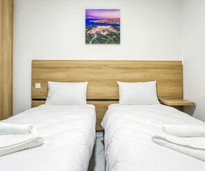 2 bedrooms, desk, iron/ironing board, travel cot