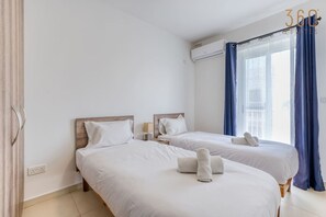 3 bedrooms, desk, iron/ironing board, travel cot