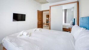 1 bedroom, desk, iron/ironing board, travel cot