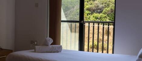 2 bedrooms, desk, iron/ironing board, travel cot