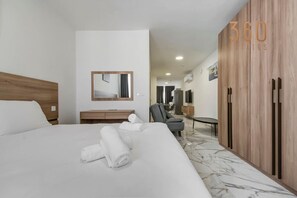 1 bedroom, desk, iron/ironing board, travel cot