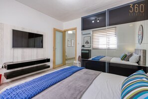 1 bedroom, desk, iron/ironing board, travel cot