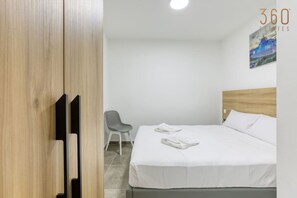 2 bedrooms, desk, iron/ironing board, travel crib