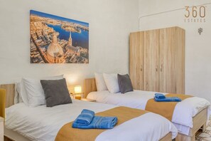 2 bedrooms, desk, iron/ironing board, travel cot